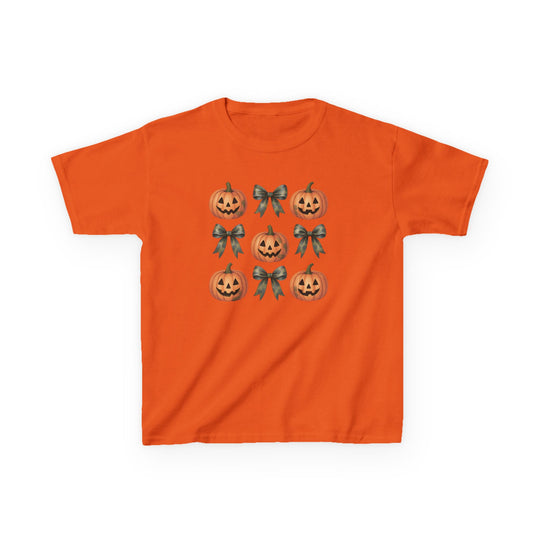 Jack and Bow Kids Tee features an orange T-shirt with a 3x3 grid of jack-o’-lanterns and ribbon bows, offering a playful and durable design.