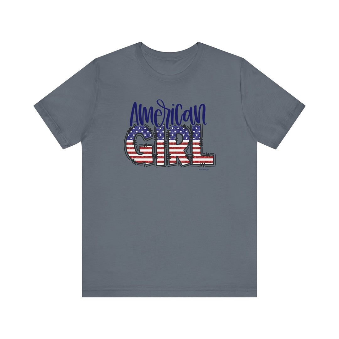 American Girl Tee: A grey t-shirt featuring a flag design. Unisex jersey tee with ribbed knit collars, taping on shoulders for better fit, and dual side seams. Made of 100% Airlume combed cotton.