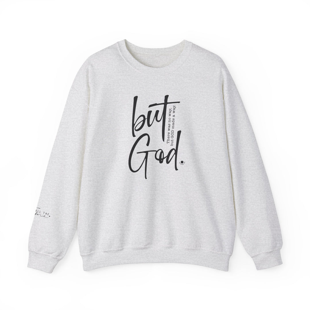 A unisex heavy blend crewneck sweatshirt, the But God Crew, offers comfort and durability. Made from 50% cotton and 50% polyester, featuring ribbed knit collar and double-needle stitching for a classic fit.