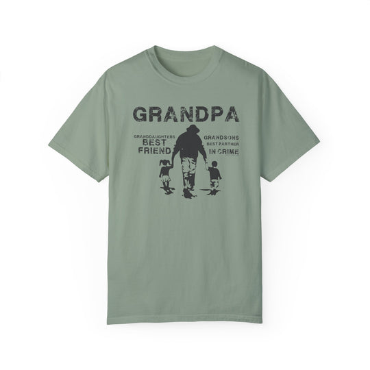Grandpa and Grandkids Tee: Green shirt featuring a man and child graphic. 100% ring-spun cotton, garment-dyed for coziness. Relaxed fit, double-needle stitching for durability. Ideal for daily wear.