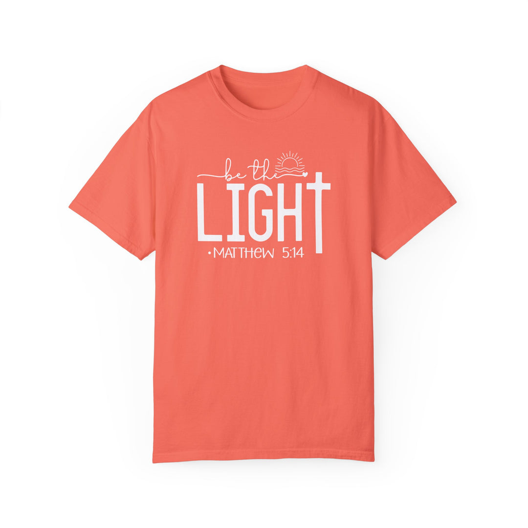 A relaxed-fit Be the Light Tee, crafted from 100% ring-spun cotton. Garment-dyed for extra coziness, featuring double-needle stitching for durability and a seamless design. From Worlds Worst Tees.