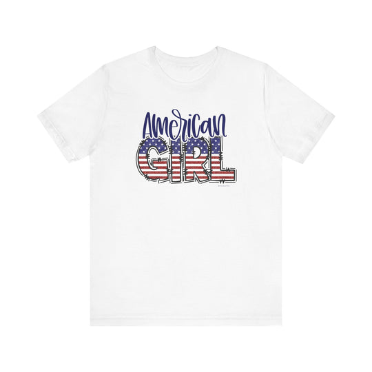 A classic American Girl Tee, featuring a white shirt with a flag and text design. Unisex jersey tee made of 100% Airlume combed cotton, with ribbed knit collars and taping on shoulders for durability. Sizes XS to 3XL available.