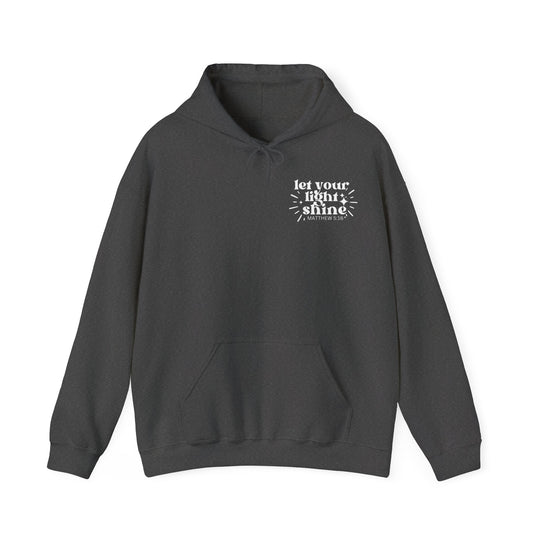 A black hooded sweatshirt with white text, featuring a kangaroo pocket and drawstring hood. Unisex heavy blend for warmth and comfort. Ideal for cold days. Let Your Light Shine Hoodie by Worlds Worst Tees.