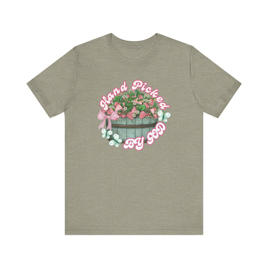 Hand Picked by GOD Tee, a classic unisex jersey short sleeve shirt, features soft cotton with ribbed knit collars and dual side seams for lasting shape.