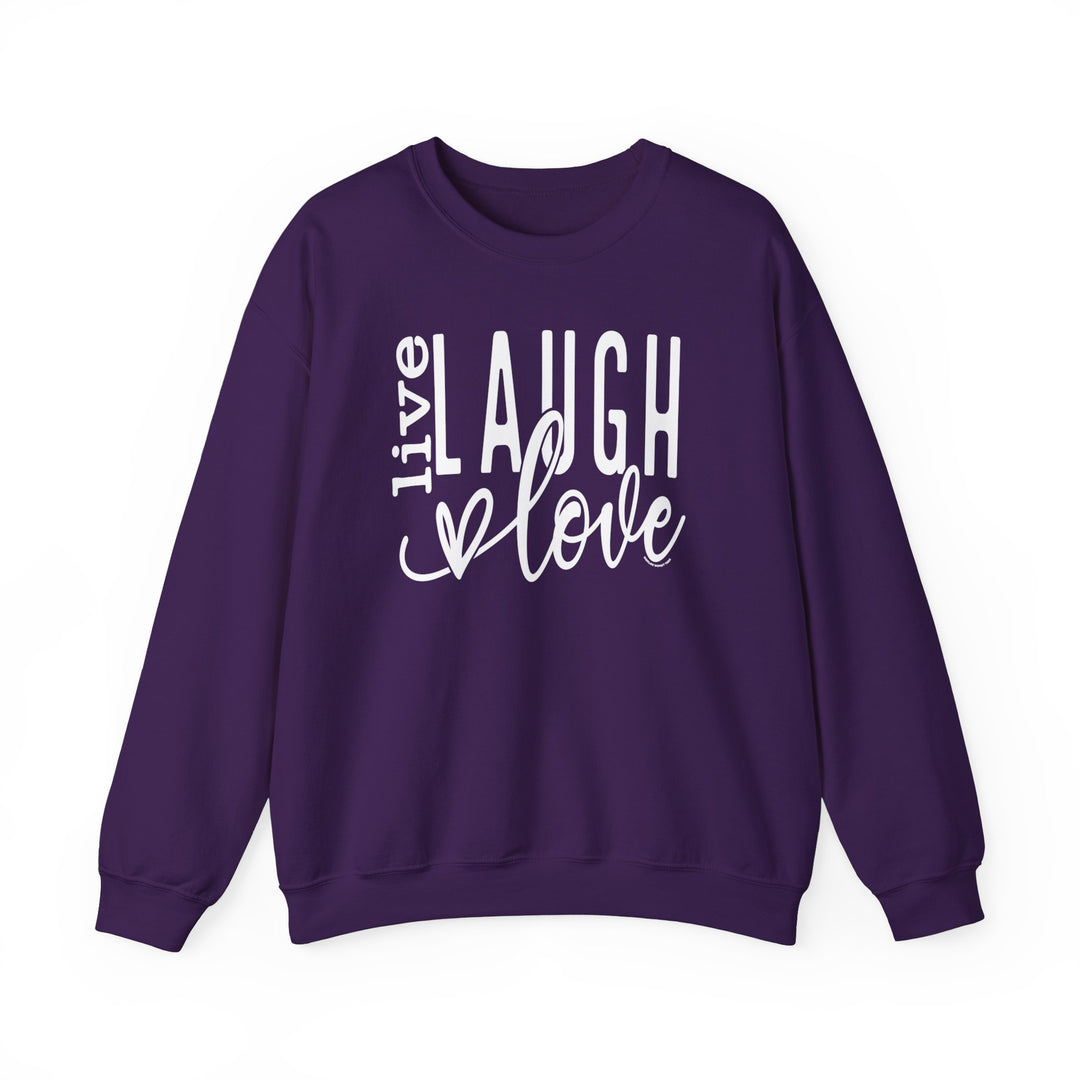 A purple sweatshirt with white text, ideal for any situation. Unisex Live Laugh Love Crew made of 50% Cotton 50% Polyester, medium-heavy fabric, loose fit, ribbed knit collar, no itchy side seams.