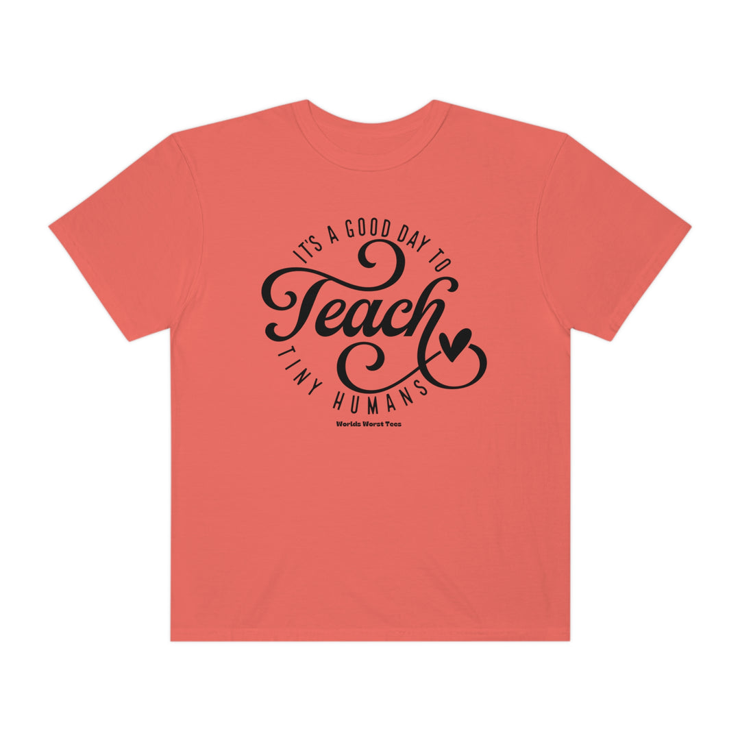 Unisex Teach Tiny Humans Tee, a black text t-shirt. Made of 80% ring-spun cotton, 20% polyester, with relaxed fit and rolled-forward shoulder. From Worlds Worst Tees.