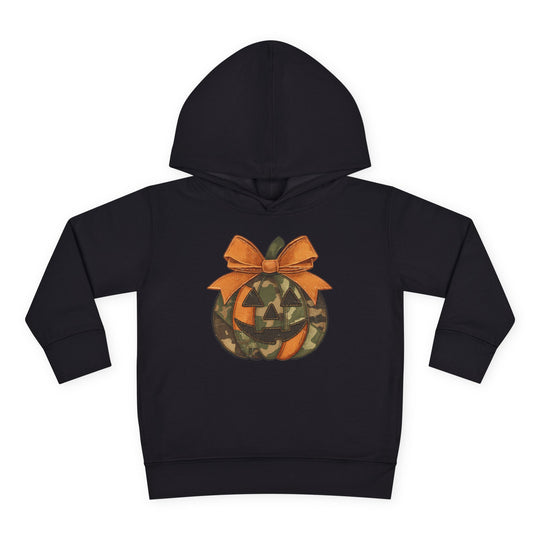 Jackie O Toddler Hoodie featuring a camouflage and orange jack-o’-lantern graphic with an orange bow on the stem, designed for comfort and durability.