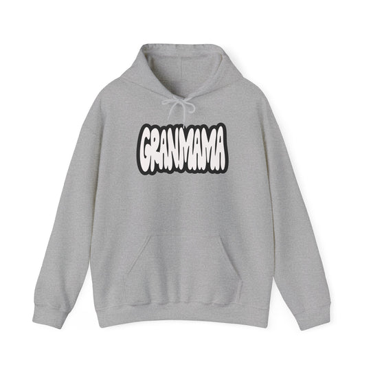 Granmama Hoodie: A cozy unisex heavy blend sweatshirt in grey with white text. Features kangaroo pocket, drawstring hood, and cotton-polyester fabric for warmth and comfort. Perfect for cold days.