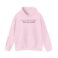 Unisex Let Everything That Has Breath Praise the Lord Hoodie, pink with black text. Heavy blend cotton-polyester fabric, kangaroo pocket, matching drawstring, cozy for cold days. From Worlds Worst Tees.