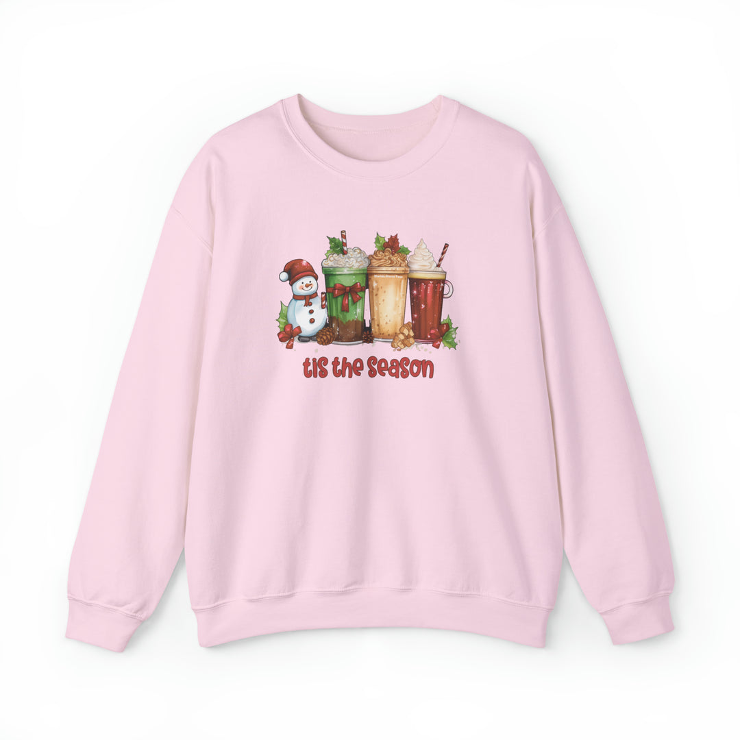 Unisex heavy blend crewneck sweatshirt featuring a festive snowman and milkshake design. Comfortable, medium-heavy fabric with ribbed knit collar. Ideal for the season. From Worlds Worst Tees.