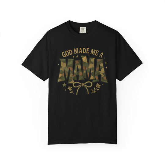 Black short-sleeved God Made Me a Mama Tee with gold lettering and camouflage MAMA graphic, featuring bow, floral sprigs, and stars.