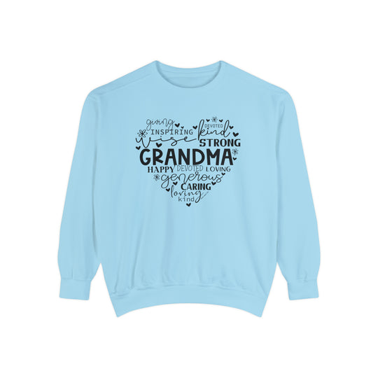 Unisex Grandma Crew sweatshirt in blue with black text. Made of 80% ring-spun cotton and 20% polyester, featuring a relaxed fit and rolled-forward shoulder. Luxurious comfort in medium-heavy fabric.