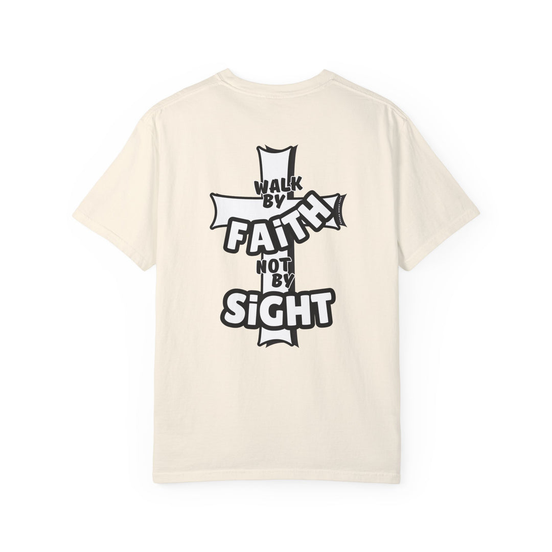 A relaxed-fit Walk By Faith Not By Sight Tee in white, featuring black text. 100% ring-spun cotton, garment-dyed for extra coziness. Durable double-needle stitching, tubular shape. Sizes: S-3XL.