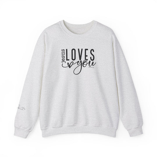 A unisex heavy blend crewneck sweatshirt featuring Jesus Loves You Crew design. Made of 50% cotton and 50% polyester, ribbed knit collar, and double-needle stitching for durability. Comfortable and cozy for colder months.