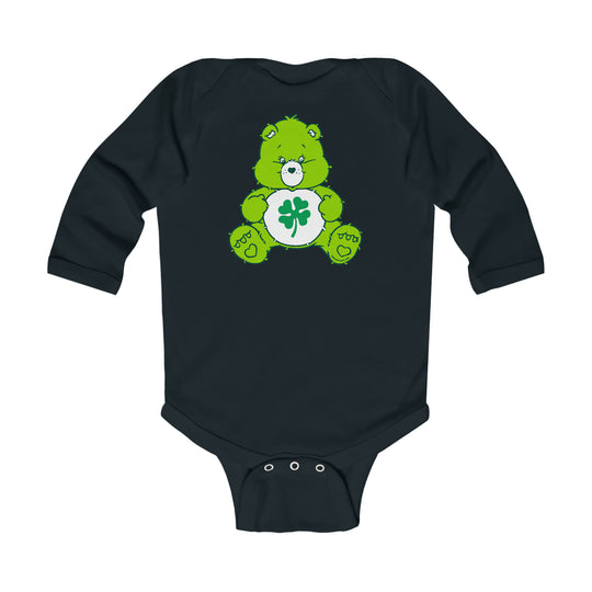 Infant Lucky Bear Onesie: A green teddy bear on a black bodysuit with a clover detail. Long sleeve bodysuit for babies, 100% combed ring-spun cotton, with plastic snaps for easy changing.