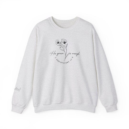 A white crewneck sweatshirt with a graphic design featuring floral elements, embodying comfort and style. Made from a blend of polyester and cotton, this cozy sweatshirt boasts a classic fit and durable construction, ideal for colder months. Crafted ethically with 100% US cotton.