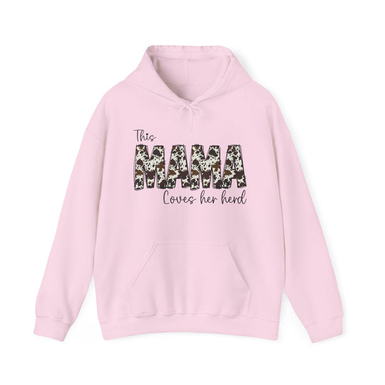 Unisex Mama Herd Hoodie: Pink sweatshirt with black and white design. Cotton-polyester blend, kangaroo pocket, drawstring hood. Classic fit, tear-away label, medium-heavy fabric. Ideal for warmth and comfort.