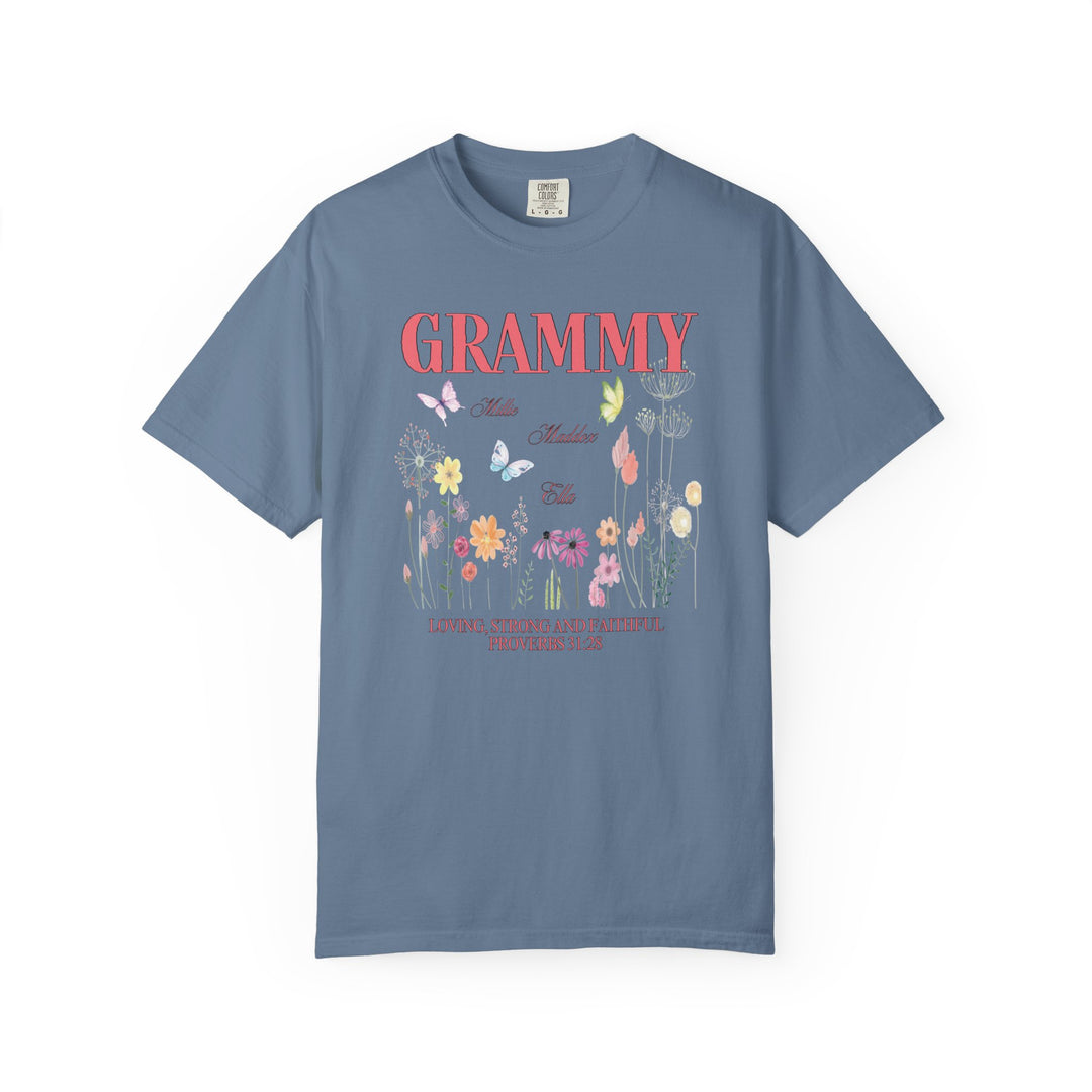 Grammy Tee featuring floral and butterfly design, crafted from soft, ring-spun cotton with a relaxed fit. Durable stitching and seamless sides for everyday comfort.