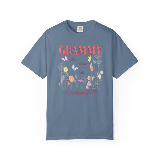 Grammy Tee featuring floral and butterfly design, crafted from soft, ring-spun cotton with a relaxed fit. Durable stitching and seamless sides for everyday comfort.