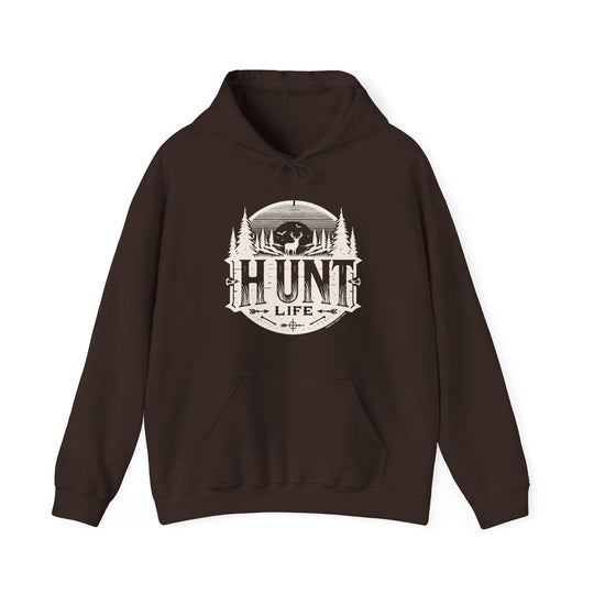 A brown Hunt Life Hoodie with a deer and tree logo on a heavy blend fabric. Features a kangaroo pocket and drawstring hood, perfect for warmth and comfort. Unisex sizing available.