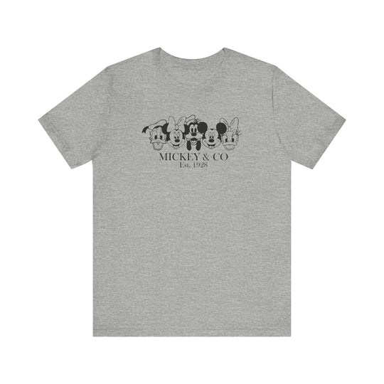 Mickey and CO Tee: A classic unisex jersey short sleeve t-shirt with a ribbed knit collar, tapered shoulders, and dual side seams for lasting shape.