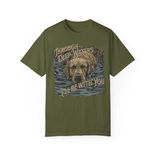 A relaxed fit Through Deep Waters Hunting Tee in green, featuring a dog design on soft ring-spun cotton. Garment-dyed for coziness, with durable double-needle stitching and no side-seams for a tubular shape.
