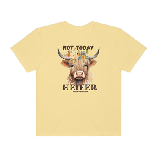 A relaxed fit Not Today Heifer Tee featuring a cow with flowers design on a yellow shirt. 100% ring-spun cotton, garment-dyed for extra coziness, with double-needle stitching for durability.