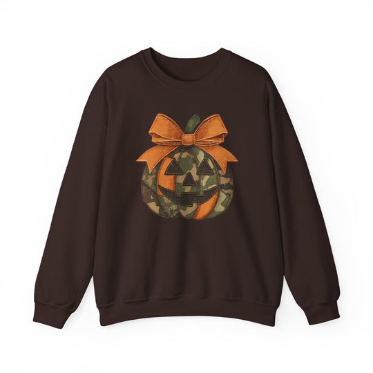 Jackie O Crew: Dark-brown sweatshirt with camouflage jack-o’-lantern graphic, orange accents, and bow. Made from cotton-poly blend for warmth and comfort.