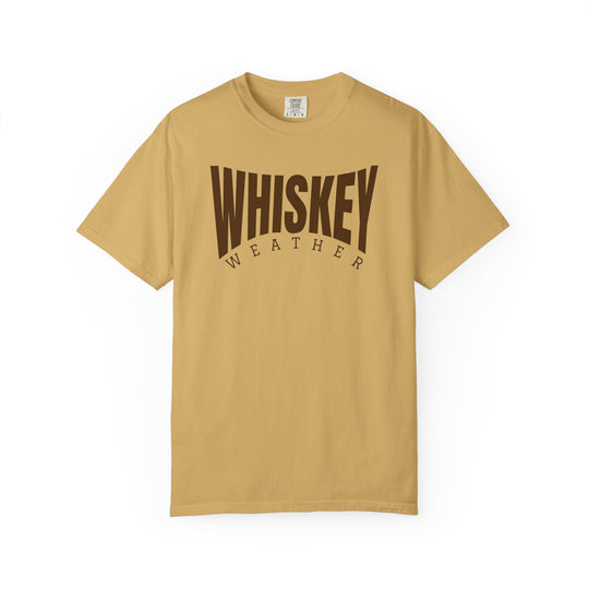 Whiskey Weather Tee: Mustard short-sleeve crew-neck with WHISKEY WEATHER in dark brown, offering a relaxed fit and durable design for everyday comfort.