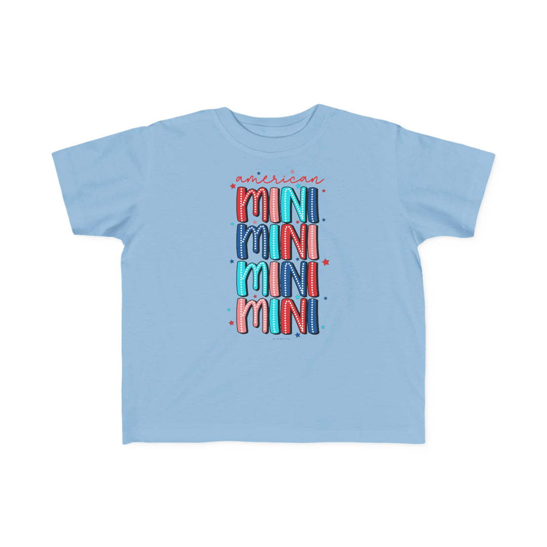 American Mini Toddler Tee featuring a blue shirt with text, perfect for sensitive skin. Made of 100% combed ringspun cotton, light fabric, tear-away label, and a classic fit. Sizes: 2T, 3T, 4T, 5-6T.