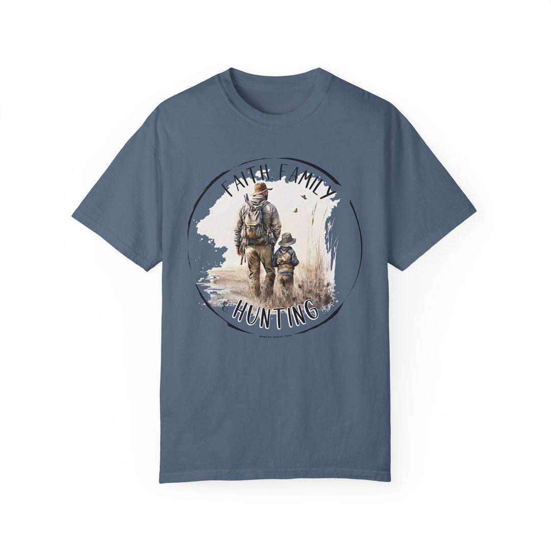 A relaxed fit Faith Family Hunting Tee featuring a man and child graphic on a blue garment-dyed t-shirt. Made of 100% ring-spun cotton for durability and comfort. Ideal for everyday wear.