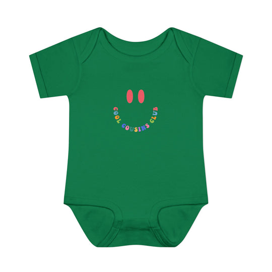 Infant unisex Cool Cousins Club onesie made from soft ring-spun cotton, featuring lap shoulders for easy dressing, ideal for comfort and mobility.