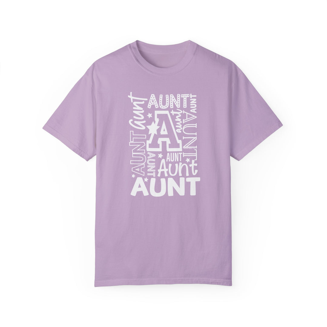 Aunt Tee: A soft, ring-spun cotton t-shirt in purple with white text. Garment-dyed for coziness, featuring a relaxed fit, double-needle stitching, and no side-seams for durability and shape retention.