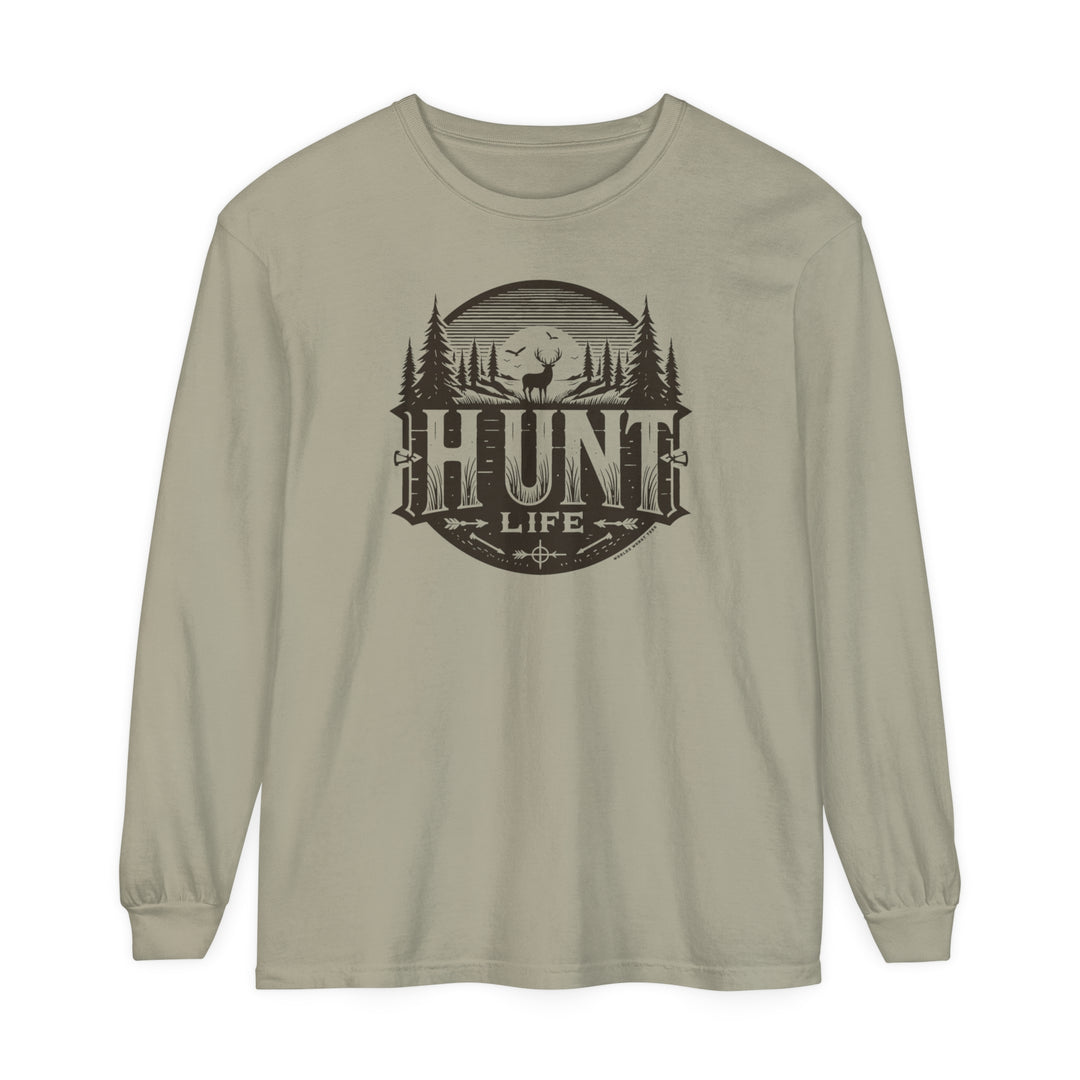 A Hunt Life Long Sleeve T-Shirt featuring a deer and tree logo on soft ring-spun cotton. Garment-dyed fabric, relaxed fit, and classic style for casual comfort. Ideal for adding to your wardrobe favorites.