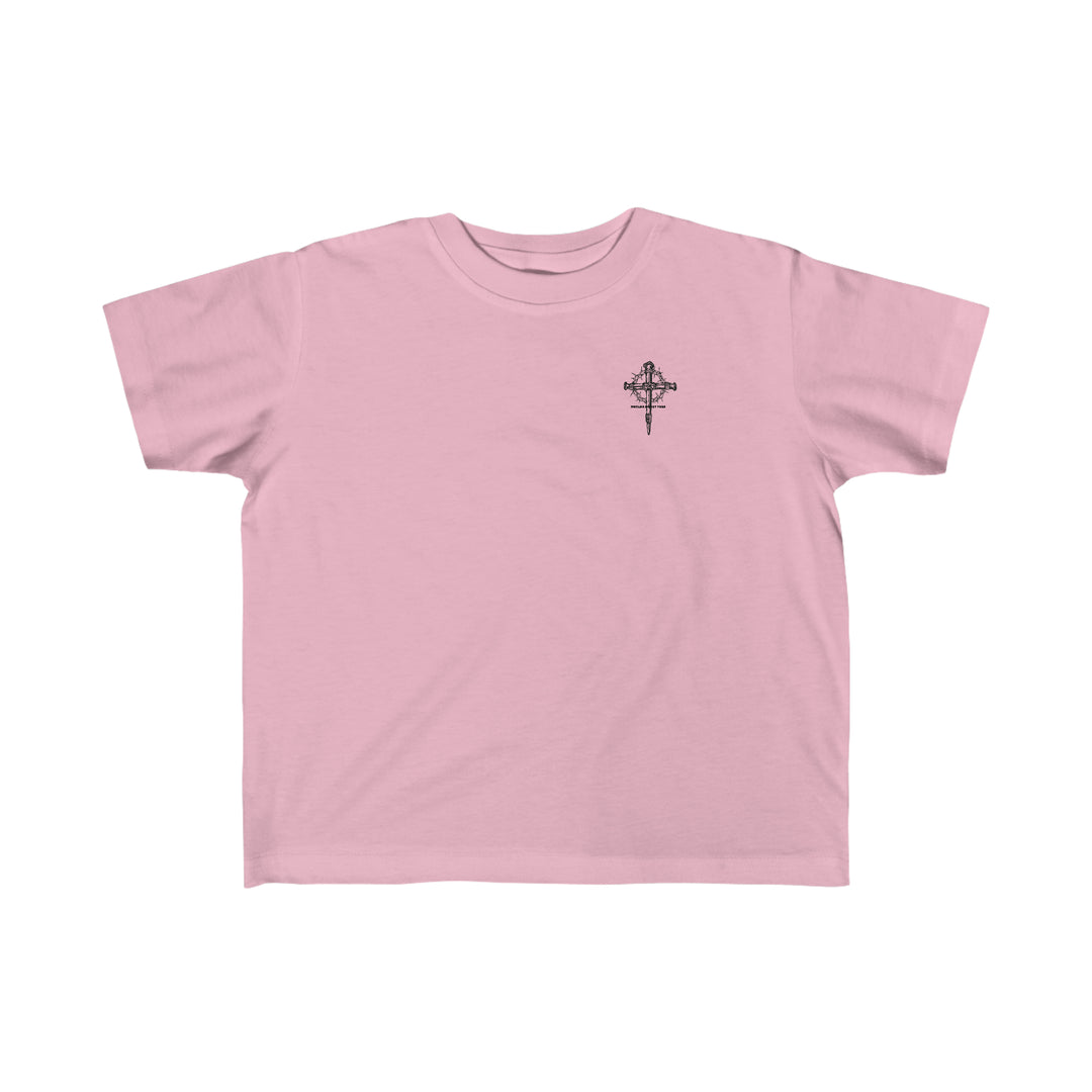 A Child of God Tee for toddlers, featuring a pink shirt with a cross logo. Made of 100% combed ringspun cotton, light fabric, tear-away label, and a classic fit. Perfect for sensitive skin.