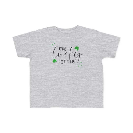 A toddler's classic fit tee, One Lucky Little Tee, featuring green shamrocks and text. Soft 100% cotton, tear-away label, perfect for sensitive skin. Sizes: 2T, 3T, 4T, 5-6T.