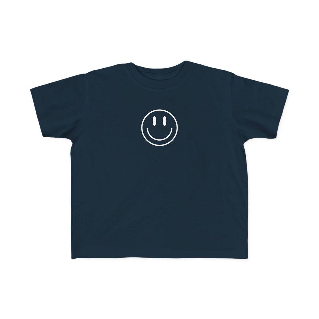 Toddler tee with a blue smiley face print. Soft, 100% combed ringspun cotton for sensitive skin. Durable, light fabric, tear-away label. Perfect for little adventurers.