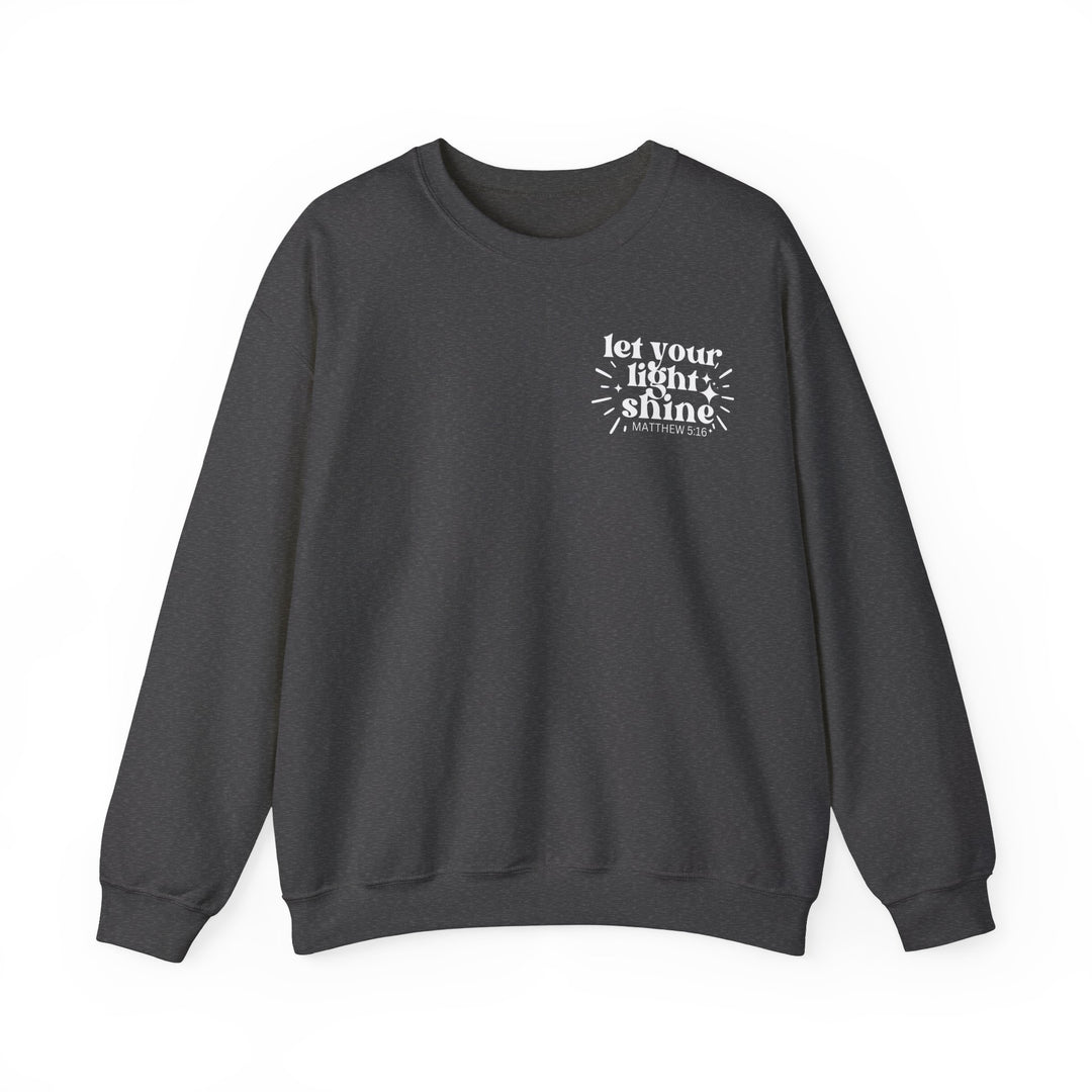 Unisex heavy blend crewneck sweatshirt featuring Let Your Light Shine Crew design. Made of 50% cotton and 50% polyester, ribbed knit collar, and no itchy side seams. Comfortable, loose fit, medium-heavy fabric.