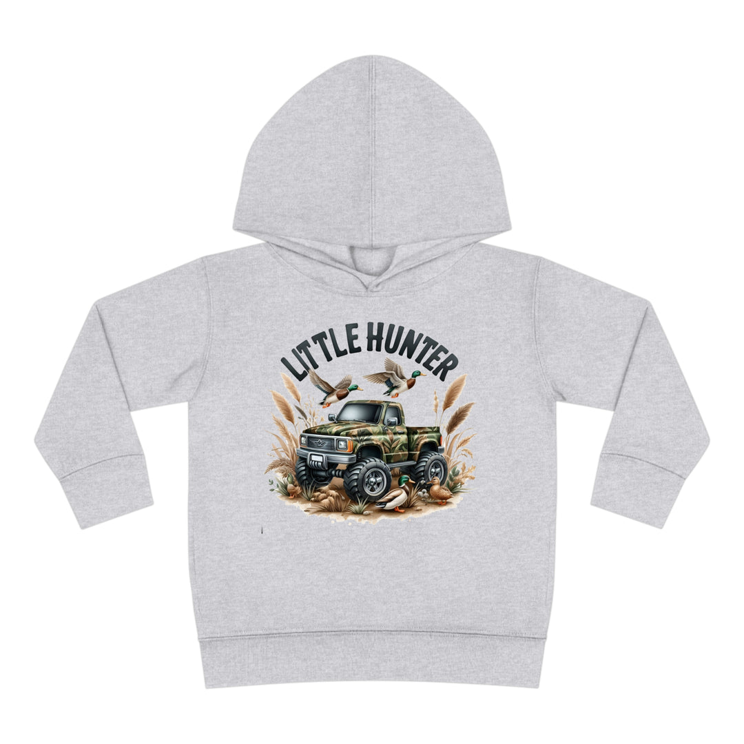 Little Hunter Toddler Hoodie featuring a truck and birds design. Jersey-lined hood, cover-stitched details, and side seam pockets for durability and coziness. 60% cotton, 40% polyester blend. Dimensions: 2T - 15.62L x 14.50W x 12.00Sleeve. From 'Worlds Worst Tees'.