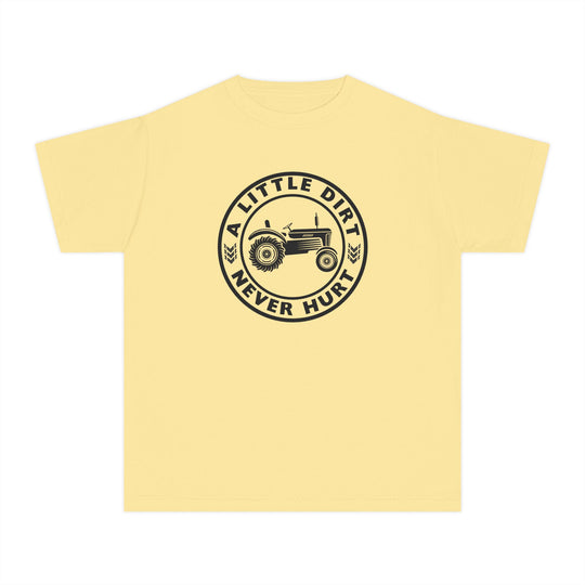 Pale yellow kids' T-shirt featuring a black circular badge with an old-style farm tractor, text A LITTLE DIRT NEVER HURT, and wheat icons.