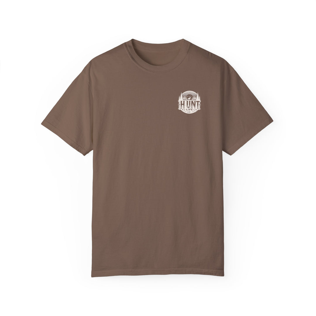 A relaxed fit Raise Um Right Tee, a brown t-shirt with a deer and trees logo. Made of 100% ring-spun cotton, garment-dyed for coziness, featuring double-needle stitching for durability.