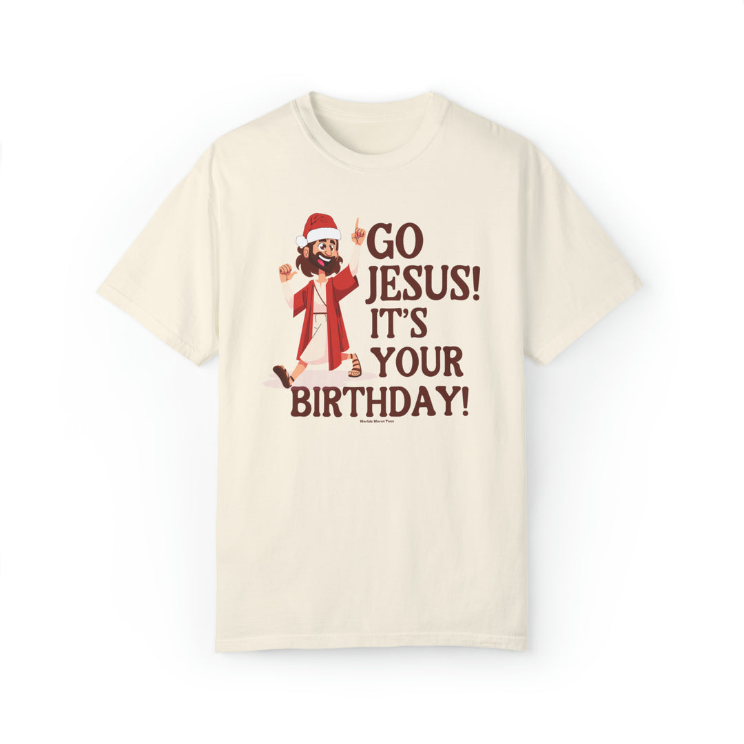 A white t-shirt featuring a cartoon character pointing up, embodying festive spirit with Go Jesus it's your birthday Tee design. Unisex, ring-spun cotton blend, relaxed fit, and rolled-forward shoulder for comfort.
