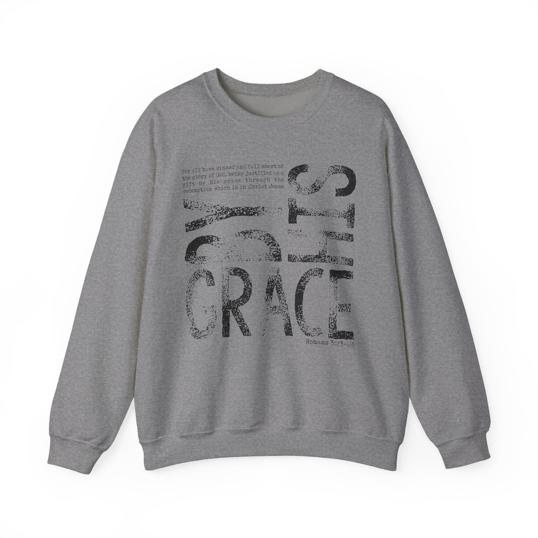 Heather-gray crewneck sweatshirt with by His grace vintage graphic, featuring Romans 3:23–24 excerpt. Cozy, durable blend; ideal for cooler months.