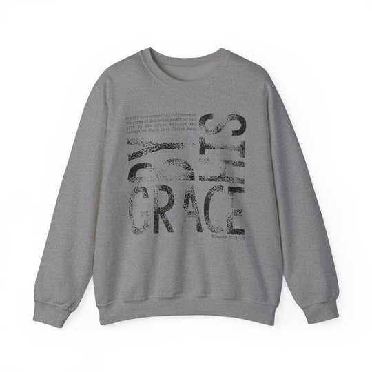 Heather-gray crewneck sweatshirt with by His grace vintage graphic, featuring Romans 3:23–24 excerpt. Cozy, durable blend; ideal for cooler months.