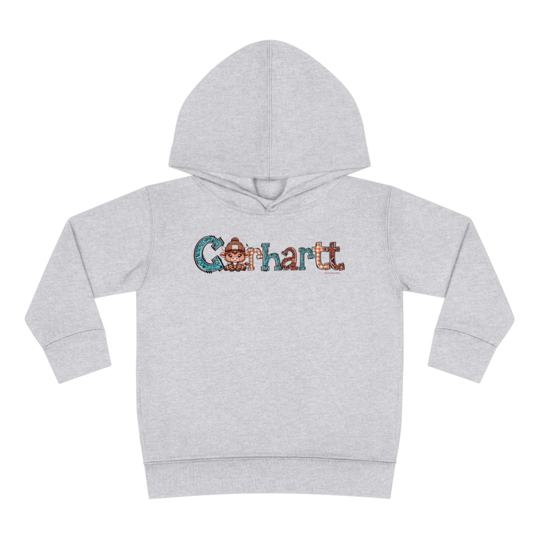Toddler hoodie featuring a cartoon cow design, jersey-lined hood, cover-stitched details, and side seam pockets for coziness. Made of 60% cotton, 40% polyester blend. From Worlds Worst Tees.