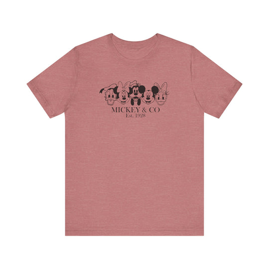 Mickey and CO Tee, a classic unisex jersey short sleeve shirt, featuring soft cotton, ribbed knit collar, and tapered shoulders for a comfortable, enduring fit.