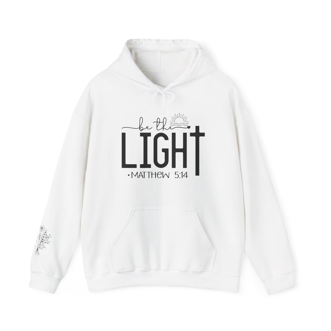 A white unisex Be the Light Hoodie, a cozy blend of cotton and polyester, featuring a kangaroo pocket and matching drawstring. Medium-heavy fabric, classic fit, tear-away label, true to size.