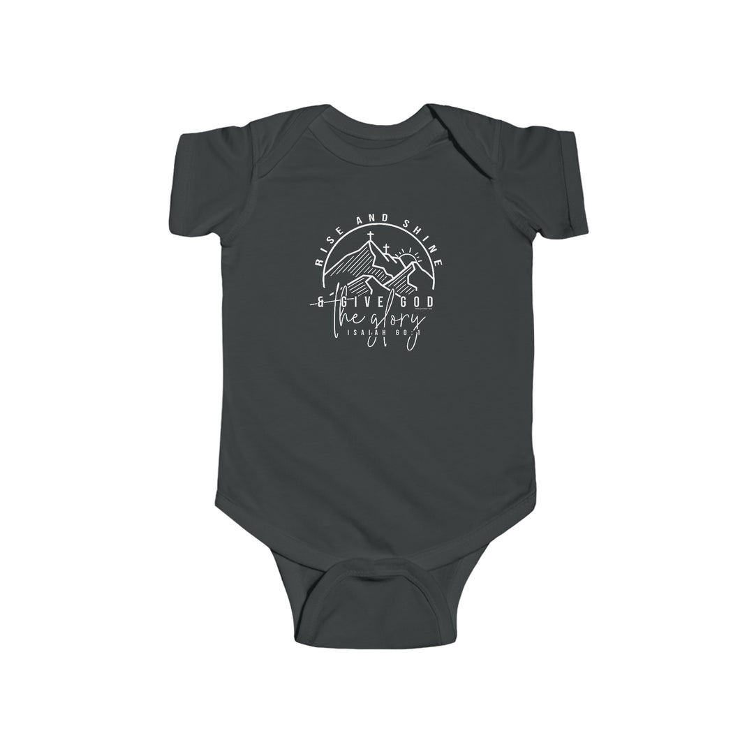 A grey baby bodysuit with white text, featuring a logo with a cross and mountains. Rise and Shine Onesie: 100% cotton, light fabric, ribbed knitting for durability, plastic snaps for easy changing. From Worlds Worst Tees.