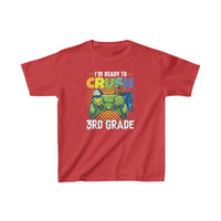 A red kids tee featuring a game controller design, ideal for everyday wear. Made of 100% cotton, light fabric, with twill tape shoulders for durability. Perfect for 3rd graders.