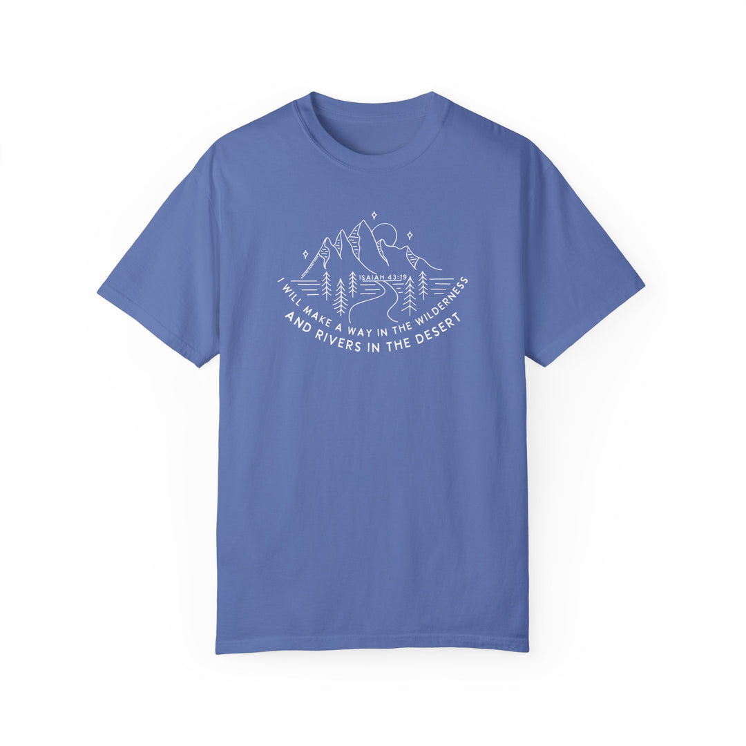 Blue t-shirt with white text, featuring a mountain and tree line drawing. 100% ring-spun cotton tee in a relaxed fit, garment-dyed for extra coziness. Durable double-needle stitching, no side-seams for a tubular shape.